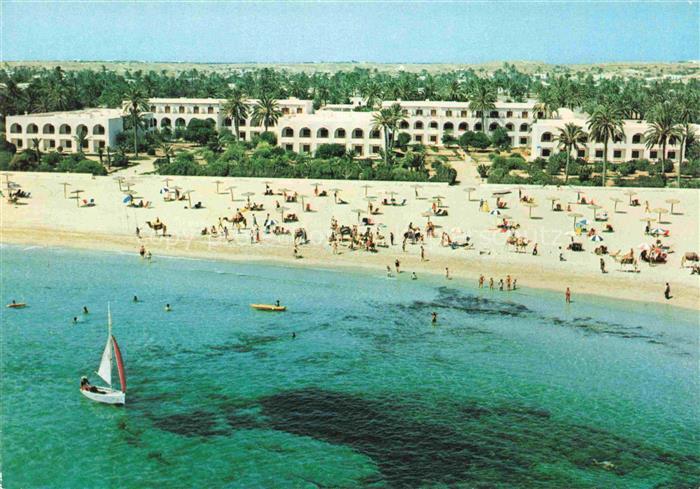 Zarzis Tunesie Strand Hotel Palmen Meer Segelboot Kamel Badegaeste Fliegeraufnah