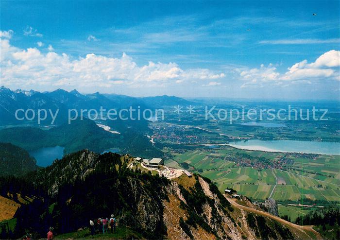 Fuessen Allgaeu Blick vom Tegelberg auf Bergstation und Fuessener Land
