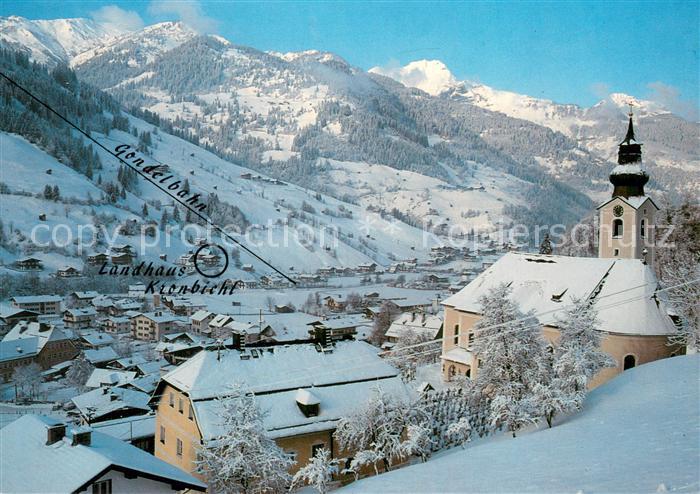 Grossarl AT Ortsansicht mit Kirche Winterlandschaft Alpen