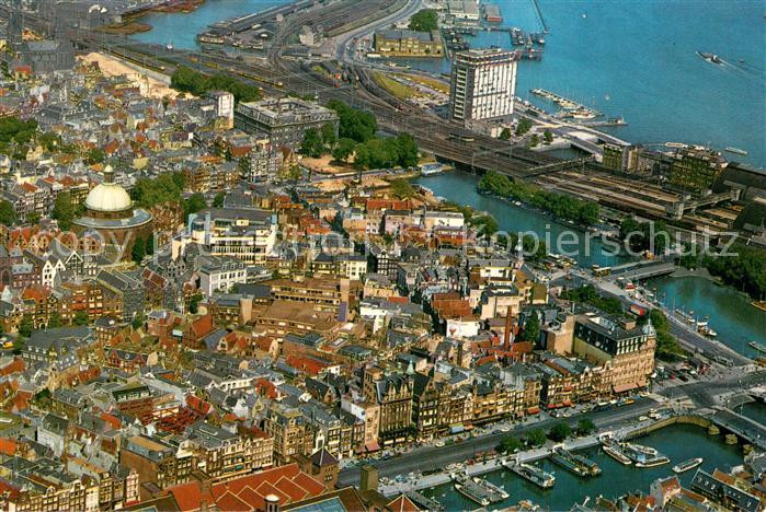 Amsterdam  NL Fliegeraufnahme Damrak Lutherse Kerk en Havengebouw