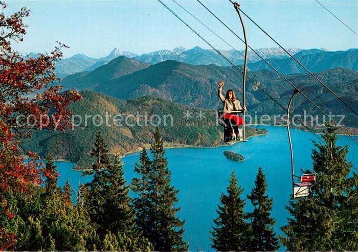 Sessellift Chairlift Telesiege Herzogstandbahn gegen Walchensee und Tiroler Berg