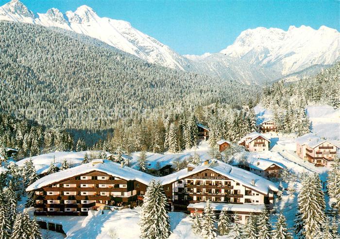 Seefeld Tirol Gartenhotel Tuemmlerhof Aussenansicht Winter-Schnee