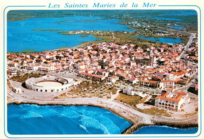 Les Saintes-Maries-de-la-Mer Vue aerienne La ville les Arenes l’Eglise les etang