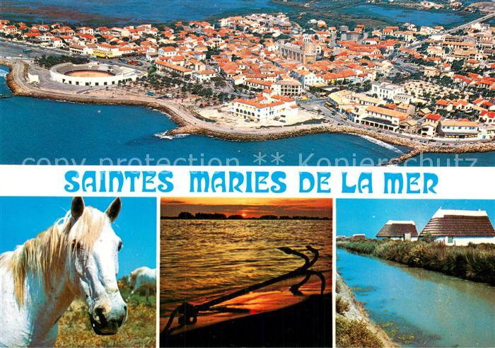 Saintes-Maries-de-la-Mer Kuestenort Luftbild Camargue Pferde Strand Anker Sonnen
