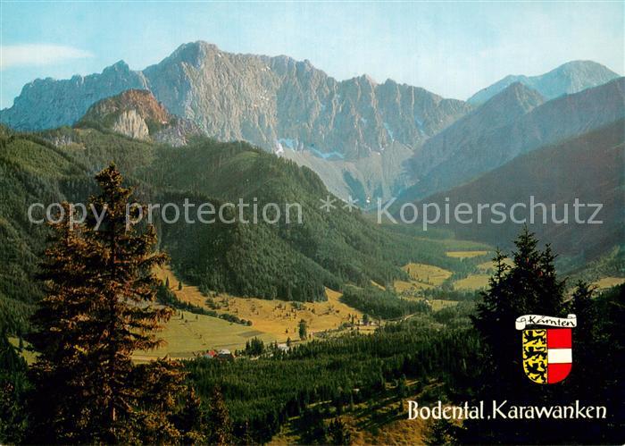 Bodental Kaernten AT Blick vom Singerberg mit Alpengasthof Sereinig Braune Wand