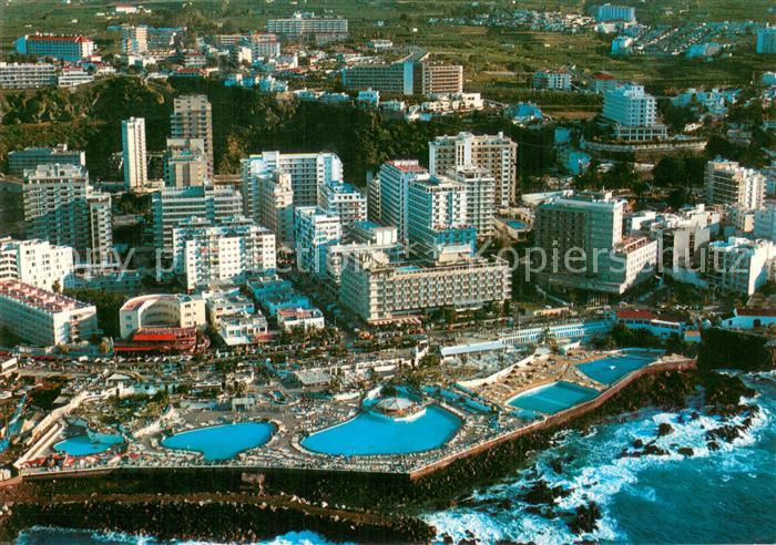 Puerto-de-la-Cruz Tenerife ES Fliegeraufnahme von Schwimmbaedern und Hotels