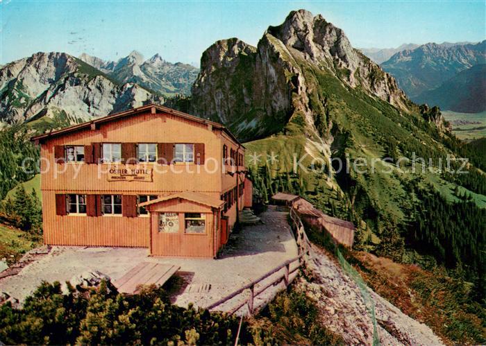 Pfronten Ostallgaeu Bayern Berggasthaus Osterhuette mit Aggenstein und Tannheime