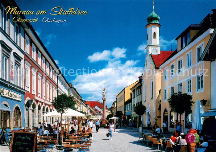 Murnau Staffelsee Obermarkt mit Mariahilfkirche und Mariensaeule