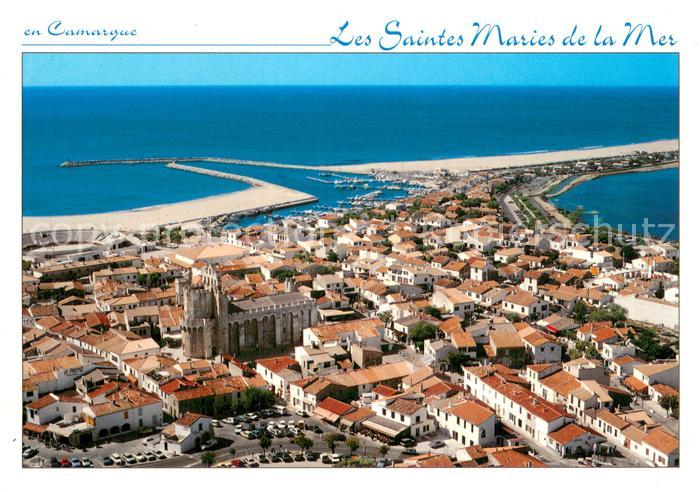 Les Saintes-Maries-de-la-Mer Image de la Camargue La ville et le por