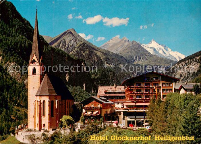 Heiligenblut Kaernten Hotel Glocknerhof Aussenansicht m. Kirche