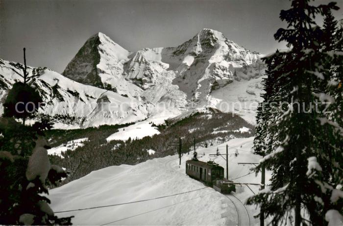 Muerrenbahn Bergbahn BE mit Eiger und Moench Berner Alpen