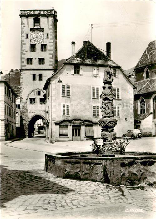 Ribeauville Haut Rhin Alsace 68 Fontaine en grès sculpté et Tour des Bouchers XI