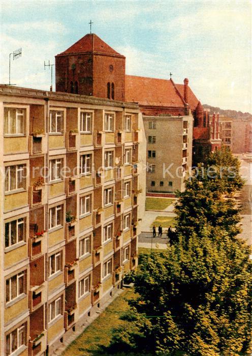 Slupsk Stolp PL Ulica Lukasiewieza w glebi kosciol Mariacki