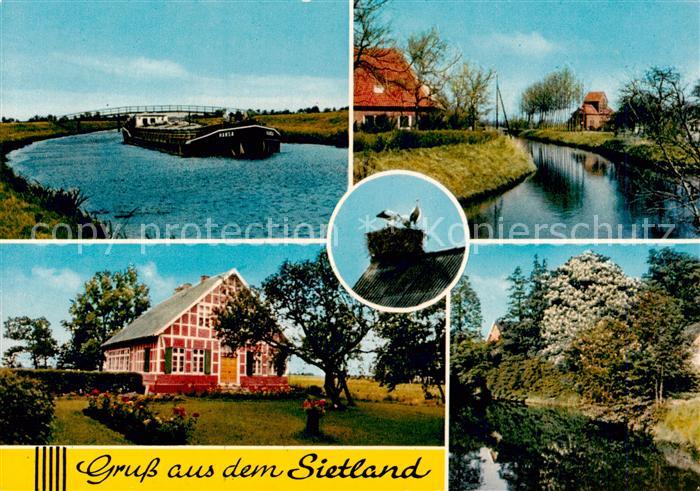 Ihlienworth Partien aus dem Sietland Kanal Frachter Storchennest Fachwerkhaus