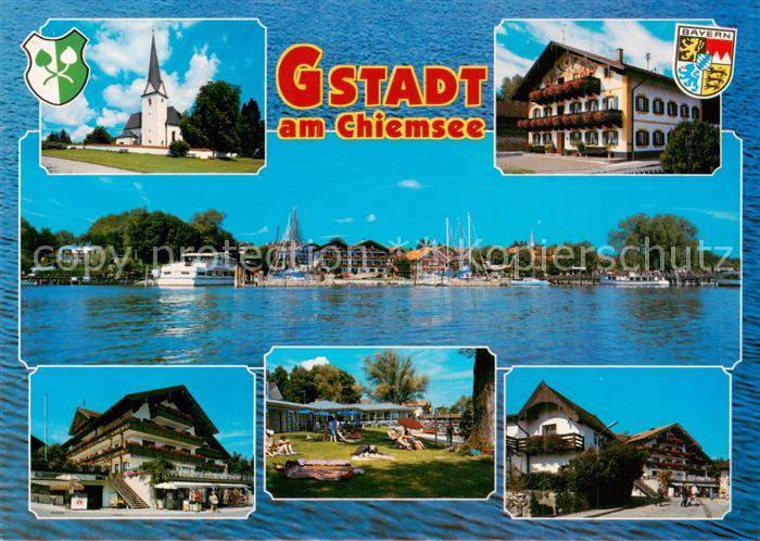 Gstadt Chiemsee Ansicht vom See aus Kirche Hotels Liegewiese