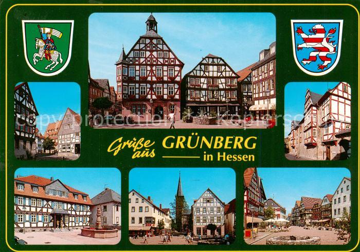 Gruenberg  Hessen Marktplatz Brunnen Kirche Fachwerkhaeuser