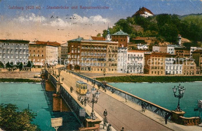 Salzburg Oesterreich Staatsbruecke und Kapuzinerkloster Strassenbahn