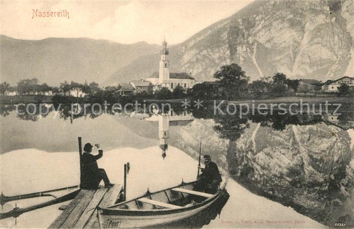 Nassereith Bootssteg Angler Wasserspiegelung Kirche Alpen