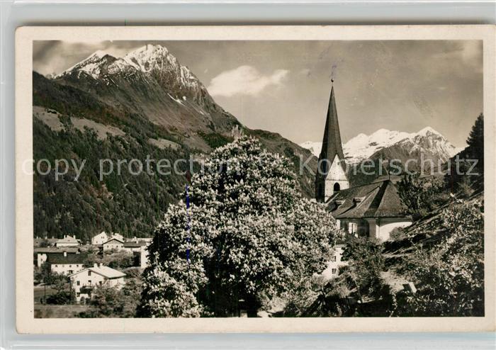 Matrei Osttirol Ortsmotiv mit Kirche Baumbluete Alpenblick