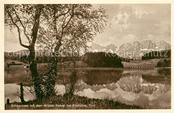 Schwarzsee Tirol Panorama mit Wilden Kaiser Kaisergebirge Wasserspiegelung
