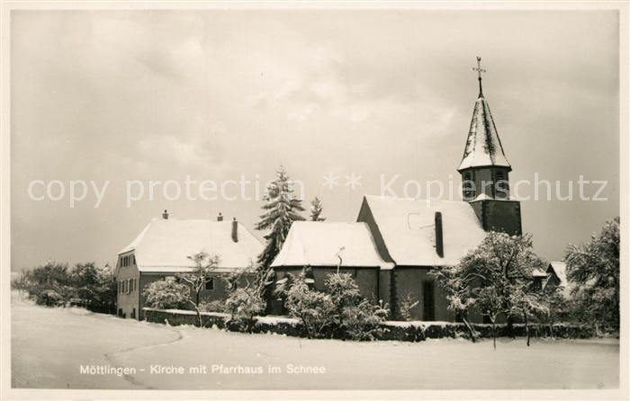 Moettlingen Kirche mit Pfarrhaus im Schnee
