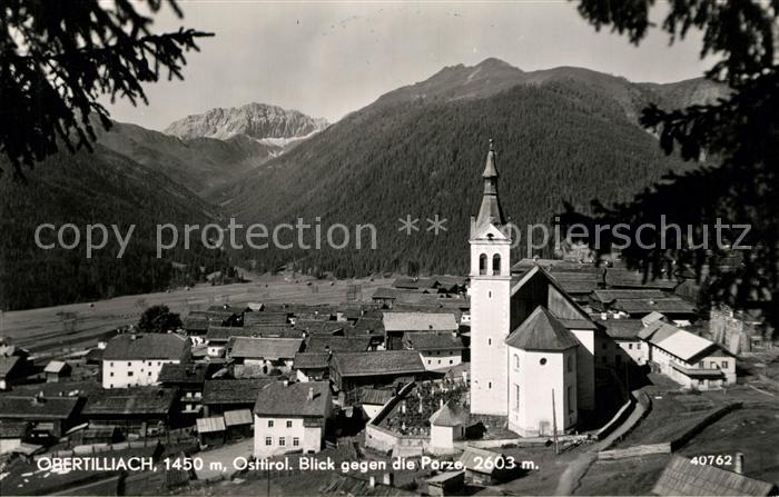 Obertilliach Ortsansicht mit Kirche Blick gegen die Porze Karnische Alpen