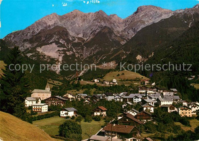 Grins Oesterreich Gesamtansicht mit Parseierspitze Lechtaler Alpen