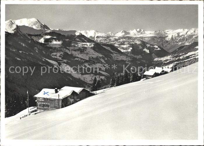 Langwies GR Skihaus Pirigen Blick gegen Toedikette Alpenpanorama