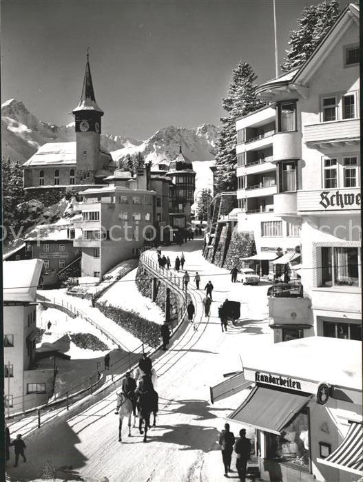 Arosa GR Strassenpartie mit Kirche und Hotel Schweizerhof