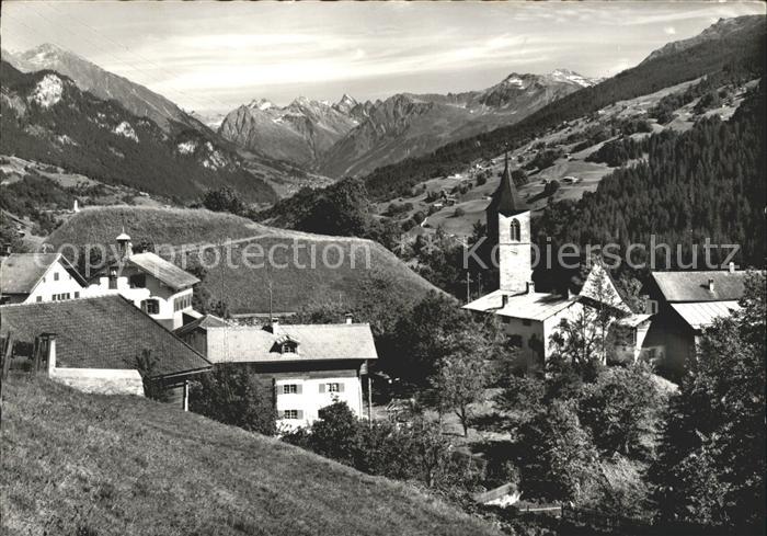 Luzein Ortsansicht mit Kirche Panorama Blick gegen Silvrettagruppe