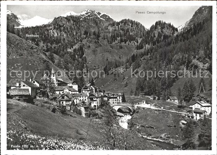 Fusio TI Ortsansicht mit Passo Campolungo