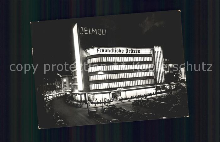 Zuerich Kaufhaus Jelmoli bei Nacht Autos
