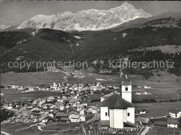 Savognin Kirche mit Piz Mitgel