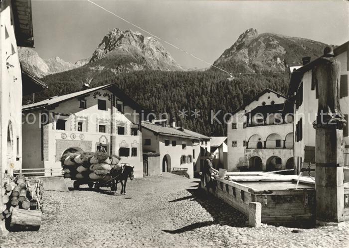 Scuol Dorfplatz Brunnen Pferdefuhrwerk Alpenblick