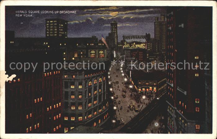 New York City Herald Square looking up Broadway at night