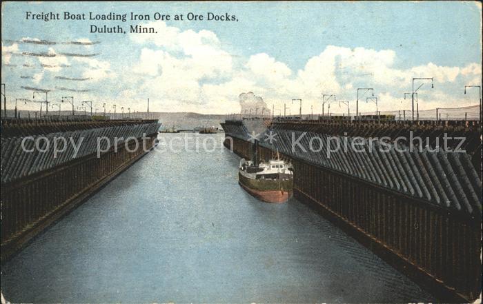 Duluth Minnesota Freight Boat loading iron at Ore Docks