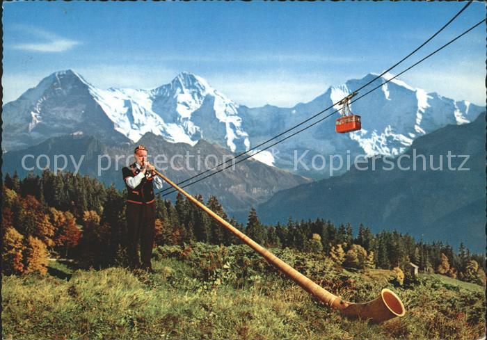 Alphorn Alphornblaeser Seilbahn Berner Oberland Eiger Moench Jungfrau