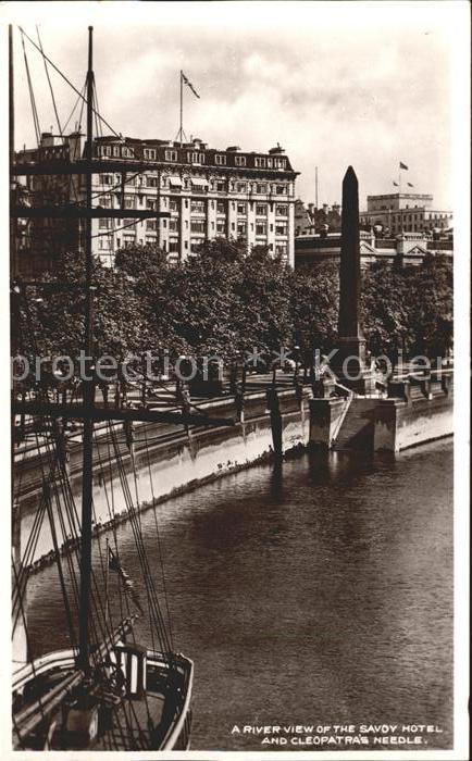 London River view of Savoy Hotel and Cleopatras Needle Sailing Boat