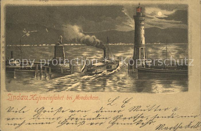 Lindau Bodensee Hafeneinfahrt Leuchtturm Dampfschiff bei Nacht