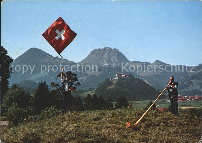 Fahnenschwingen Alphornblaeser Gruyeres