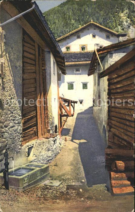 Filisur Dorfpartie Buendner Haeuser Brunnen