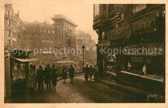 Paris La Port Saint Denis vue de la Rue de la