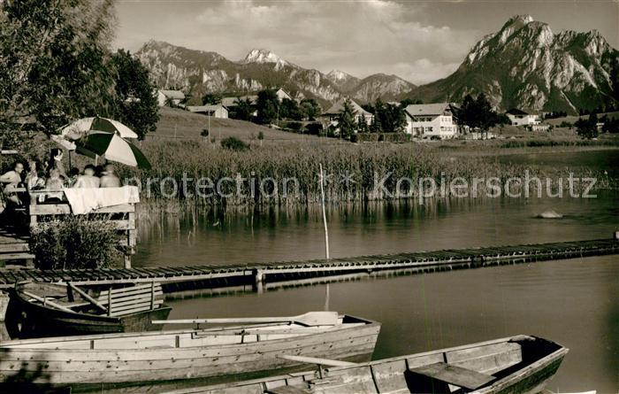 Hopfensee mit Brandnerschrofen Hohem Straussberg Kreuzspitze und Saeuling