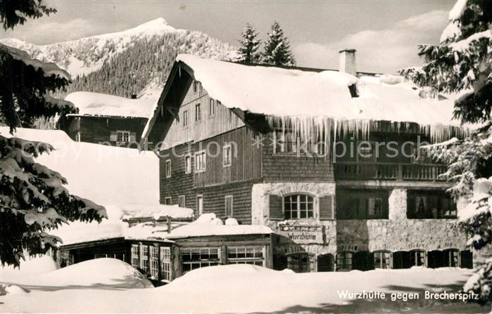 Schliersee Wurzhuette gegen Brecherspitze Winterlandschaft Alpen
