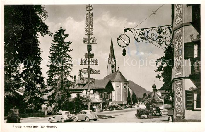 Schliersee Dorfmotiv mit Maibaum Blick zur Kirche