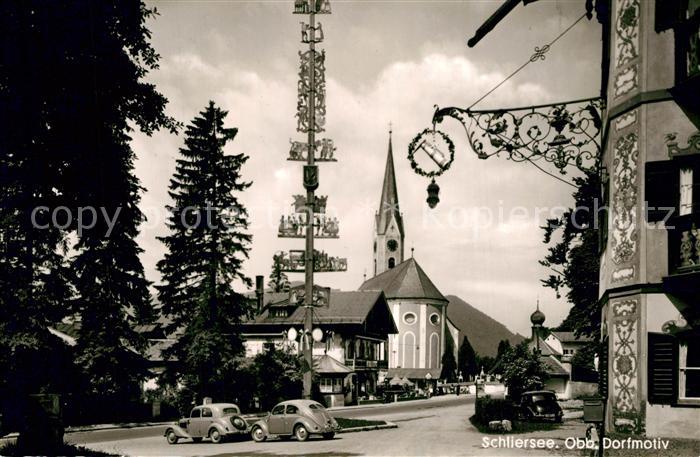 Schliersee Dorfmotiv mit Maibaum Blick zur Kirche