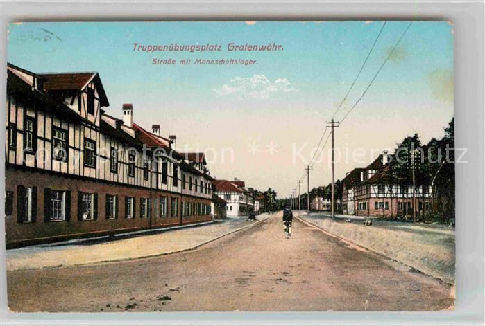 Grafenwoehr Truppenuebungsplatz Strasse mit Mannschaftslager