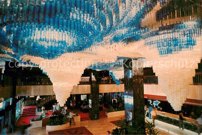 Singapore Shimmering down from the lobby ceiling in a modern blend of light