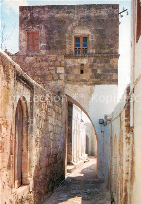 Lindos Lindo Rhodes Greece Portal und Zimmer eines Kapitaens ueber der Strasse
