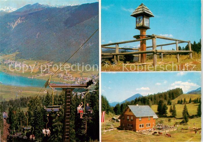 Weissensee Kaernten AT Sessellift zur Naggler Drachselkreuz Bildstock